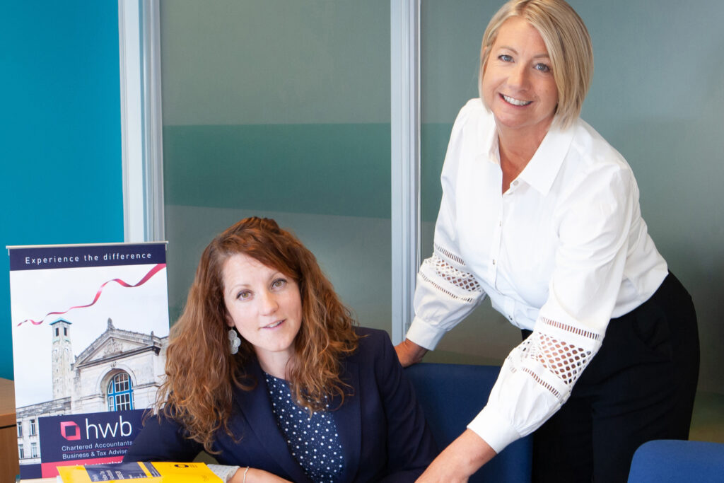 Gemma Hedges and Tracy Jenkins at a desk