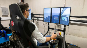Man using a flight simulator