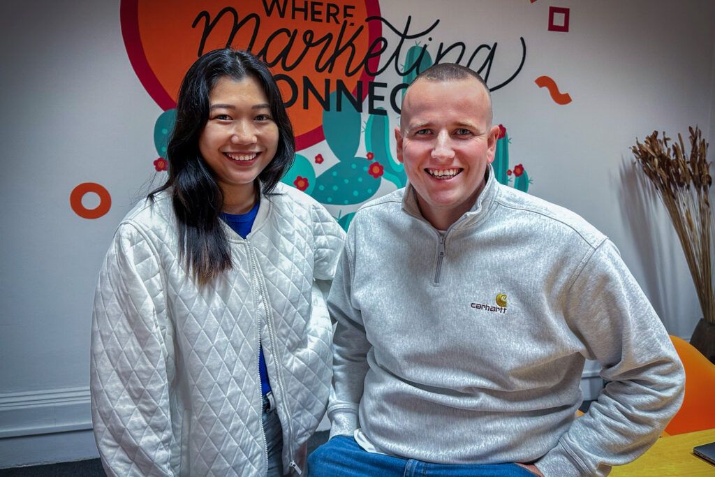 Eve Su, new Account Executive at Carswell Gould, with Nathan Crowe, Graphic Designer
