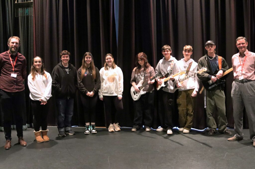 Rob Collier, Curriculum Manager, left, with performing arts students Erin Marlow, Atlas Wright, Phoebe Newman-Moore and Amber Crawford; music students El Grist, Kris Thubron, Torin Croisant and Zeph Brailey; and music teacher Tim Jackson