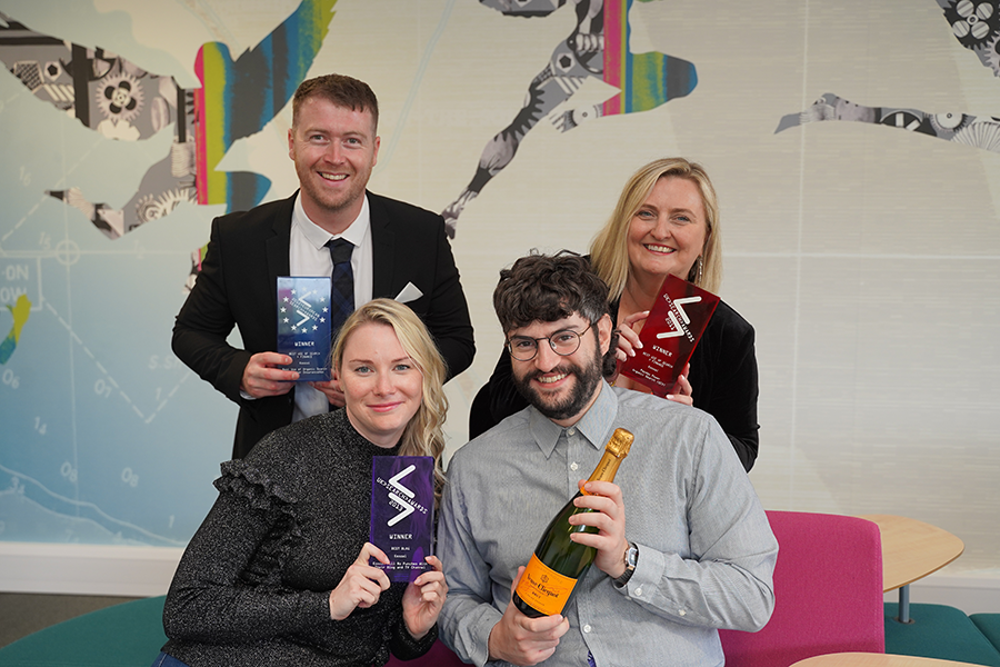 Koozai’s Head of Paid Media Steve Harris (top left), Managing Director Sophie Roberts (top right), Head of Operations Kelly-Anne Crean (bottom left), and Paid Media Manager Joaquin Lopez (bottom right) celebrate promotions and Koozai’s 18th birthday at their Fareham Headquarters.