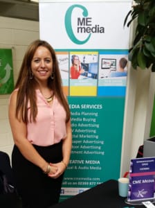 Charisse at exhibition stand for CMe Media